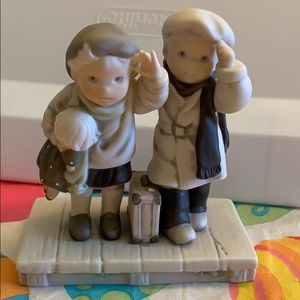 Kim Anderson’ “Thursday Child” porcelain figuine